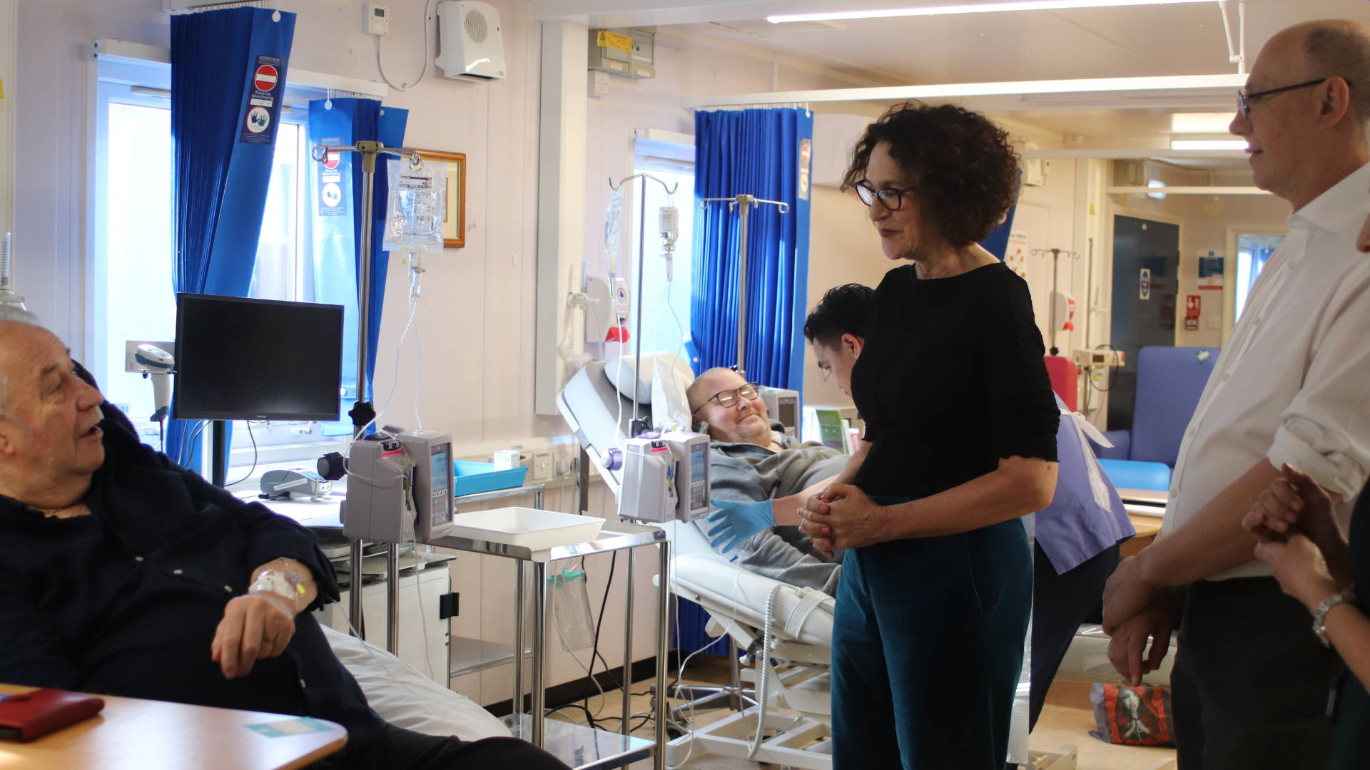 Baroness Merron talking to a patient